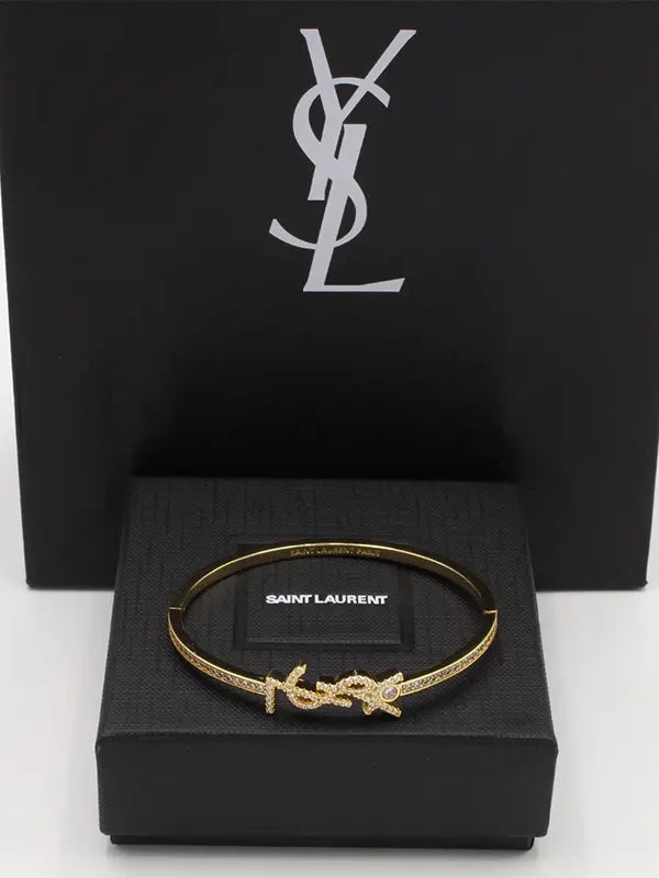 اساور ايف سان لوران زركون بانقل لوقو اسواره ysl ذهبي