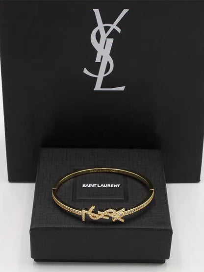 اساور ايف سان لوران زركون بانقل لوقو اسواره ysl ذهبي