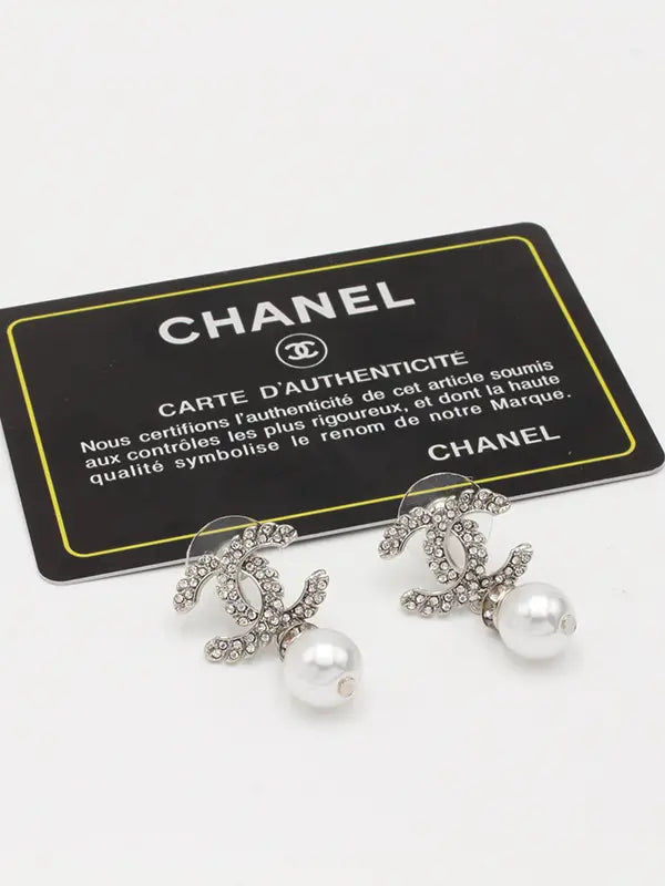 حلق شانيل 555 حلق chanel فضي