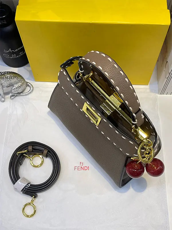 شنطة فندي بنية بتعليقه كرز شنط وحقائب fendi bags