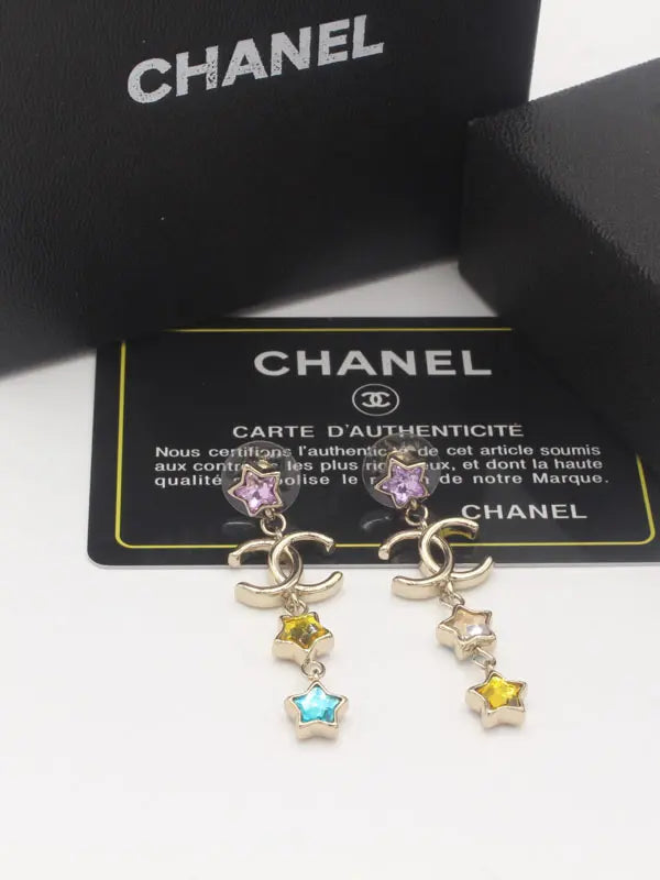 حلق شانيل انتيك برونز 661 حلق chanel ذهبي