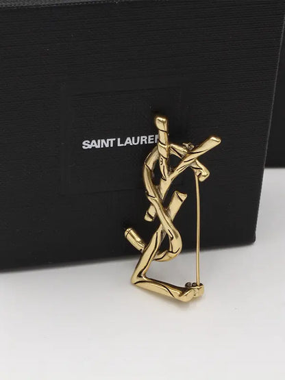 بروش ايف سان لوران انتيك قولد بروش ysl