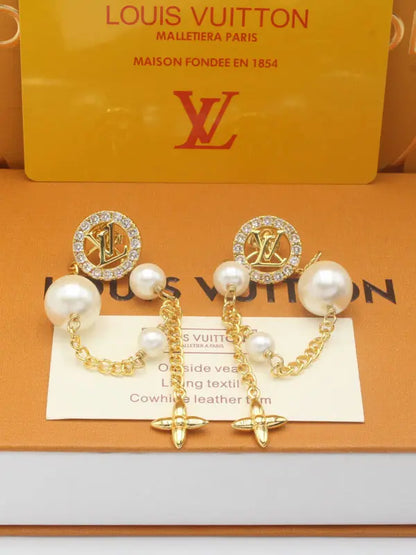 حلق لويس فيتون لونق بيرل زركون ماستر 701 حلق louis vuitton ذهبي