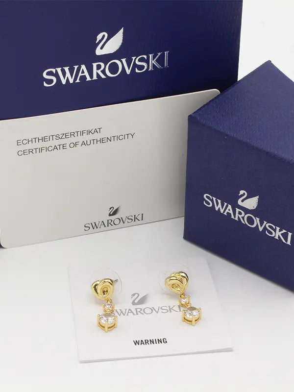 حلق سواروفسكي هارت بندنت لوقو حلق Swarovski ذهبي