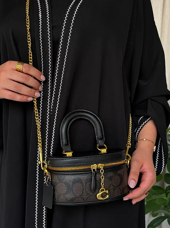 شنطة كوتش مني بوتيك الجديده