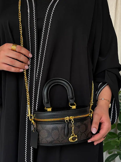 شنطة كوتش مني بوتيك الجديده