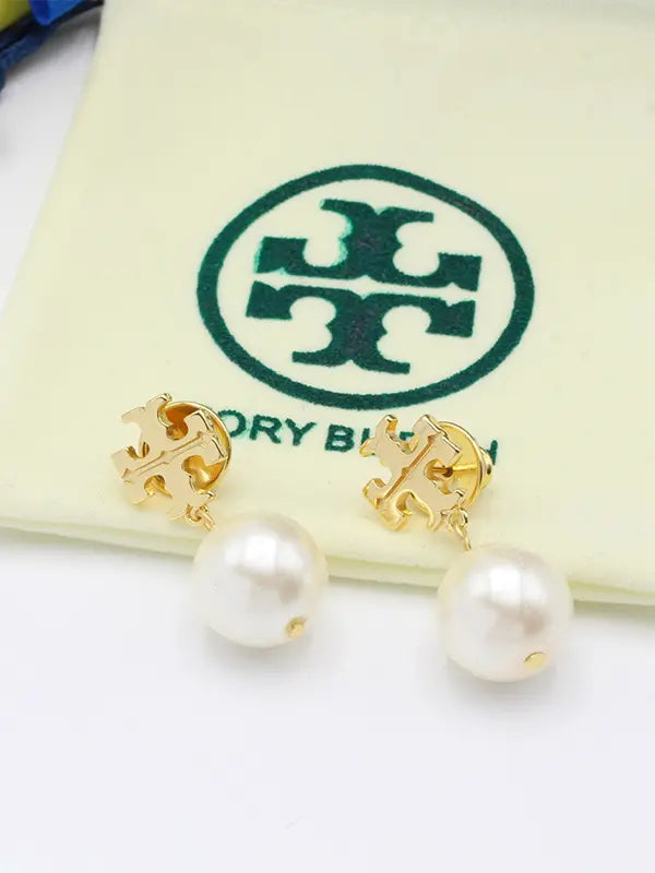 حلق توري بورش لولو حلق tory burch ذهبي