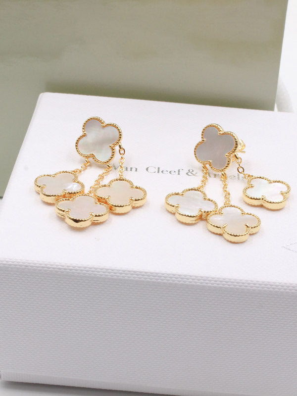 حلق فان كليف 4 ورود وسط حلق van cleef ابيض
