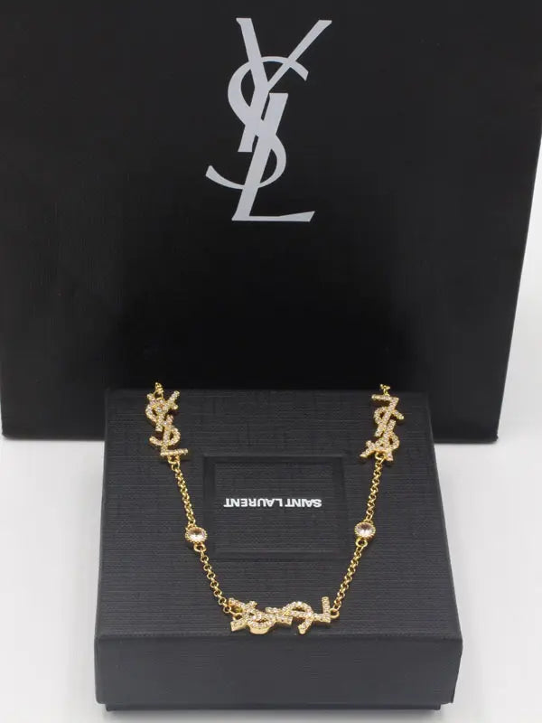 سلسال ايف سان لوران زركون لوقو سلسال ysl