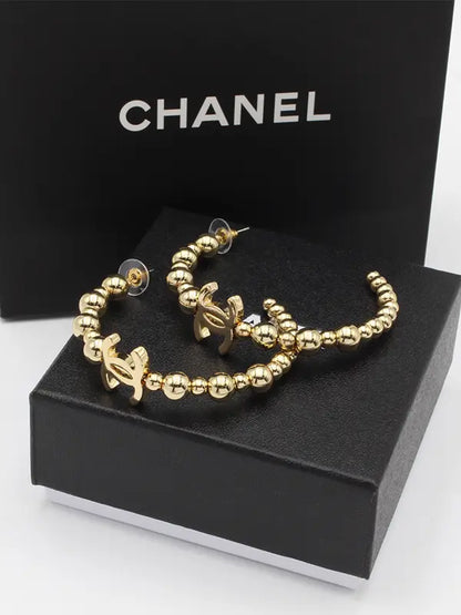 حلق شانيل كبير ميتال ذهبي لوقو حلق chanel