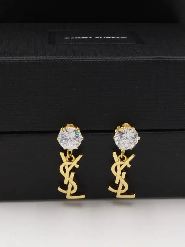 حلق ايف سان لوران ماستر 697 حلق ysl ذهبي