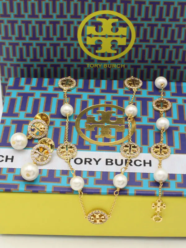 طقم توري بورش 3 قطع زركون ولولو اطقم tory burch ذهبي