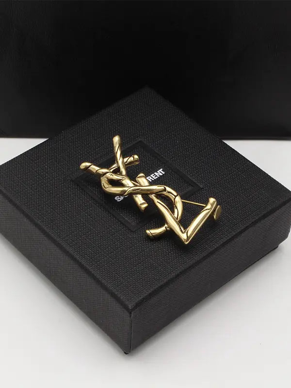 بروش ايف سان لوران انتيك قولد بروش ysl