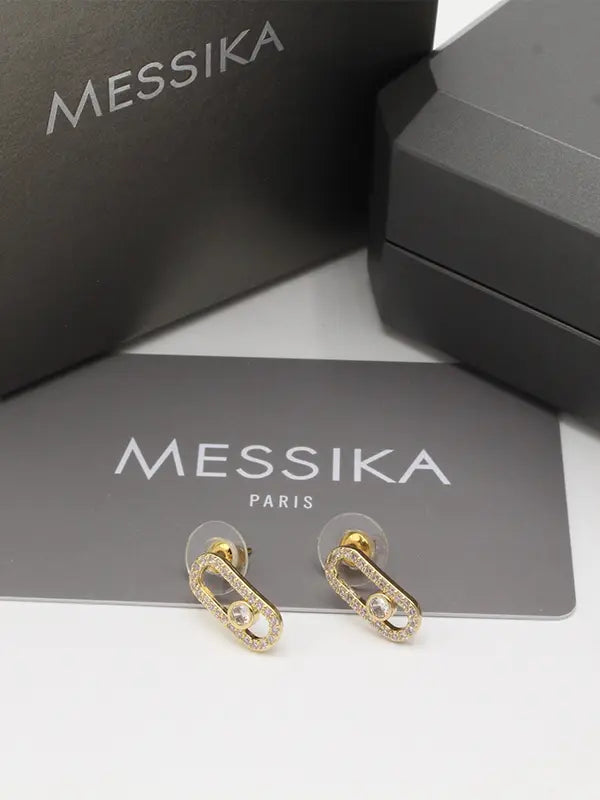 حلق ميسيكا زركون وسط حلق messika ذهبي