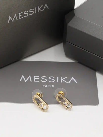 حلق ميسيكا زركون وسط حلق messika ذهبي