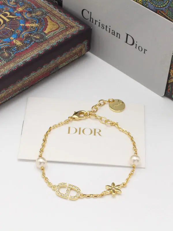 اسواره ديور وذ فلاور بيرل لوقو اسواره dior ذهبي