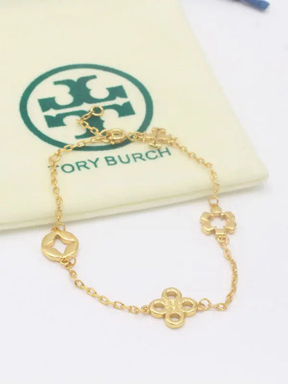 اسواره توري بورش ميتال 867 اسواره tory burch ذهبي