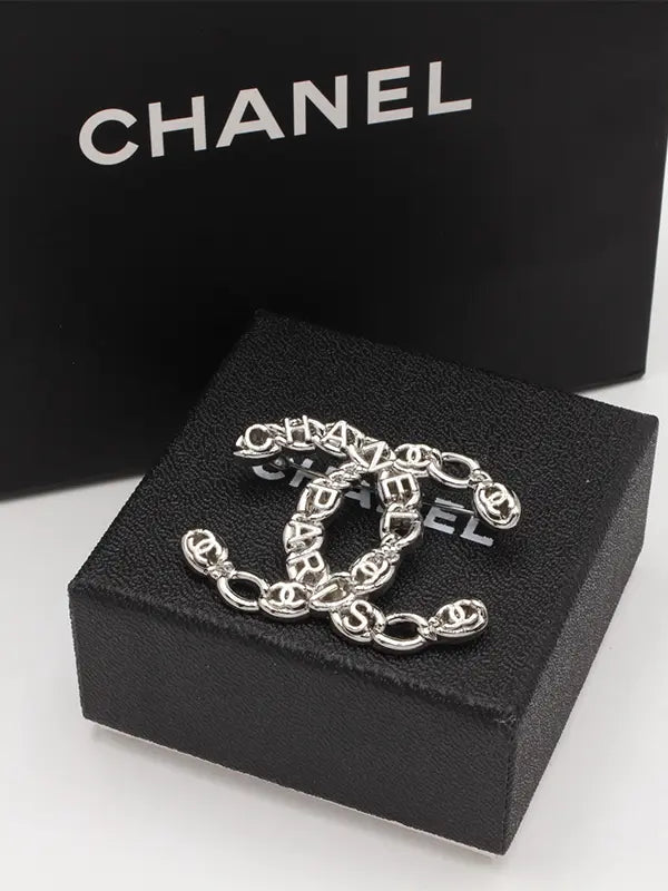 بروش شانيل ميتال لوقو 219 بروش chanel