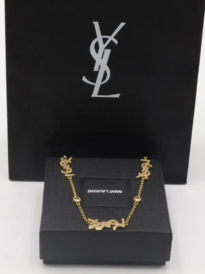 سلسال ايف سان لوران زركون لوقو سلسال ysl