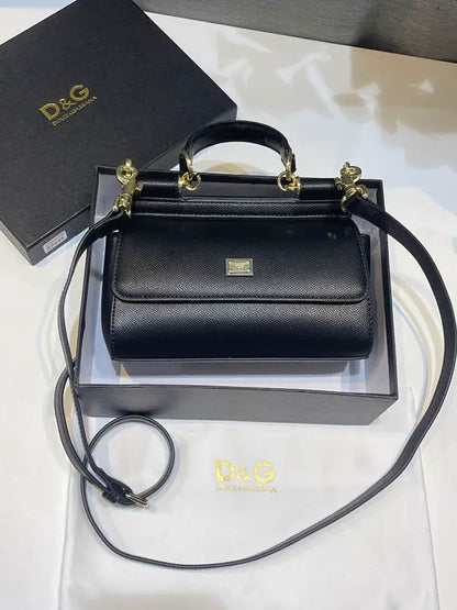 شنطة دولتشي قبانا اسود جلد ماستر شنط وحقائب tory burch اسود