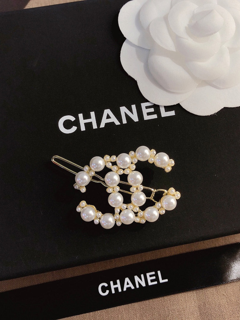 بكلة شعر شانيل لوقو اكسسوارات شعر chanel ذهبي