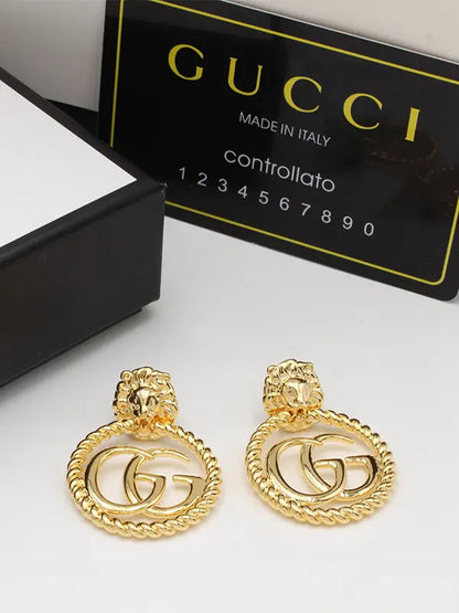حلق قوتشي انتيك مدور كبير حلق gucci ذهبي