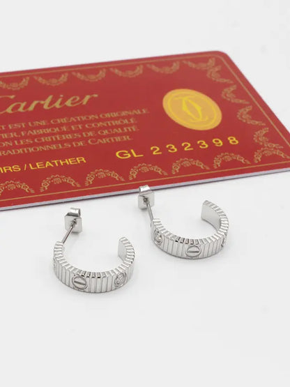 حلق كاتير زركون الهبه لوقو حلق CARTIER فضي