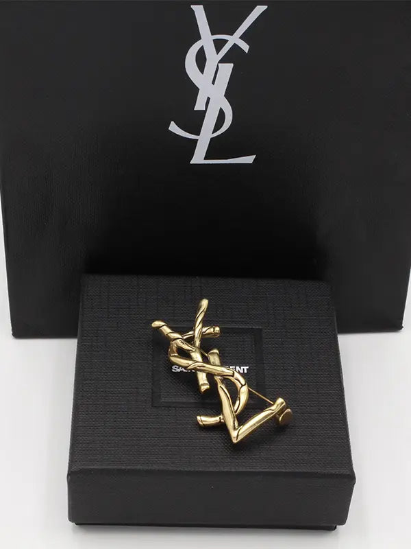 بروش ايف سان لوران انتيك قولد بروش ysl