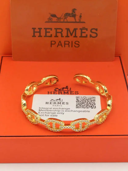 اساور هيرمز ماستر لوقو زركون اسواره HERMES ذهبي