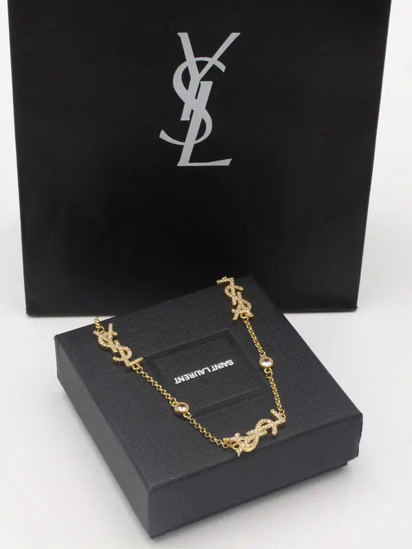 سلسال ايف سان لوران زركون لوقو سلسال ysl