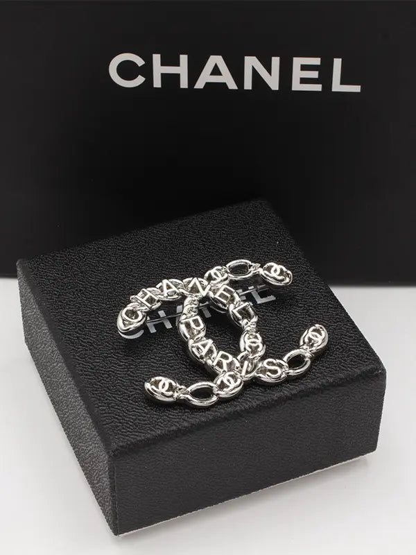بروش شانيل ميتال لوقو 219 بروش chanel