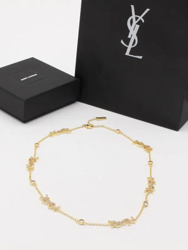 سلسال ايف سان لوران زركون لوقو سلسال ysl