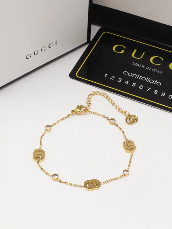 اسواره قوتشي 724 اسواره gucci ذهبي