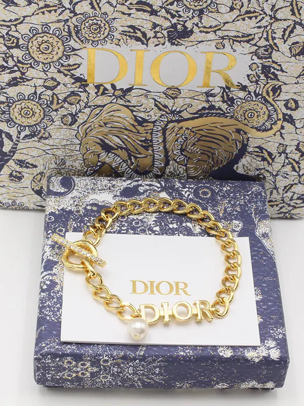 اساور ديور نيو شيب لوقو اسواره dior ذهبي