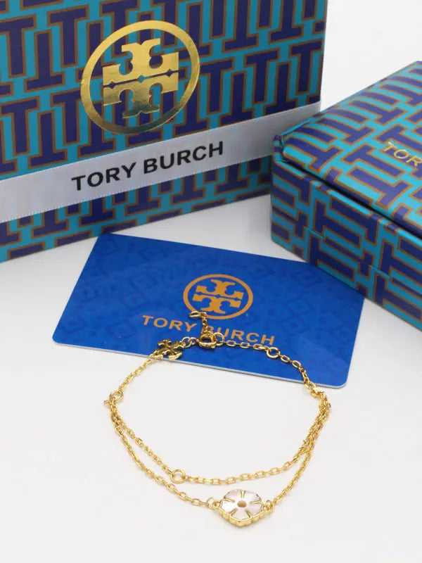 اسواره توري بورش تو لاينز 866 اسواره tory burch ذهبي