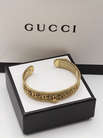 اساور قوتشي عريضه لوقو برونز اسواره gucci