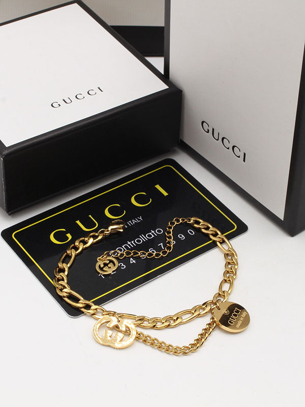 اساور قوتشي داون شاين لوقو اسواره gucci ذهبي