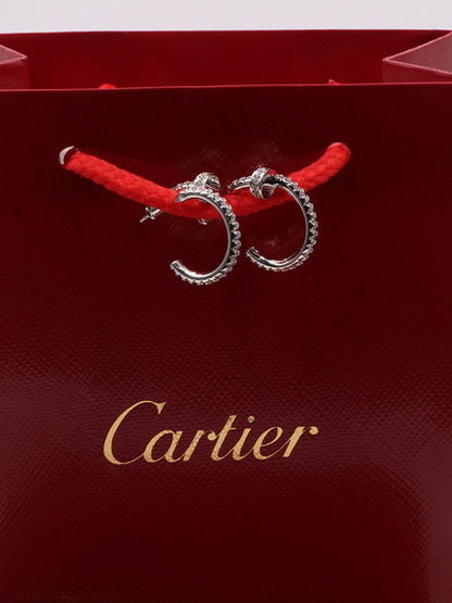 حلق كارتير مسمار زركون وسط حلق CARTIER  