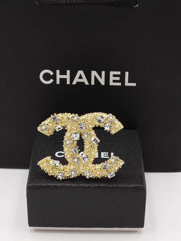 بروشات شانيل ملتي ستون بروش chanel ذهبي 