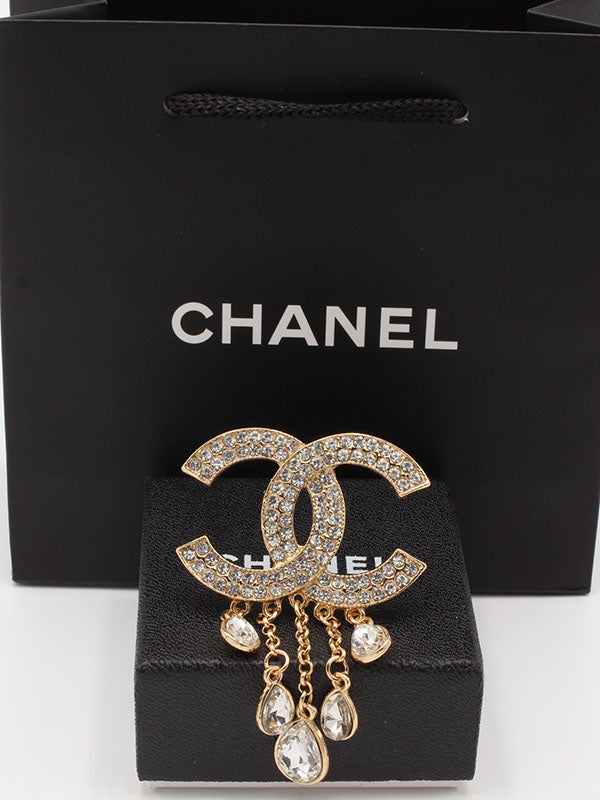 بروشات شانيل كريستال هدب بروش chanel ذهبي 