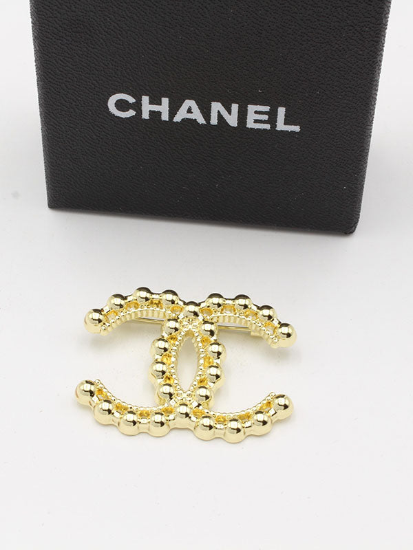 بروشات شانيل ميتال بروش chanel ذهبي 