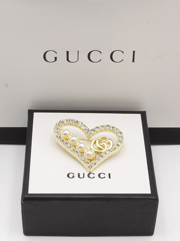 بروشات قوتشي بروش gucci  