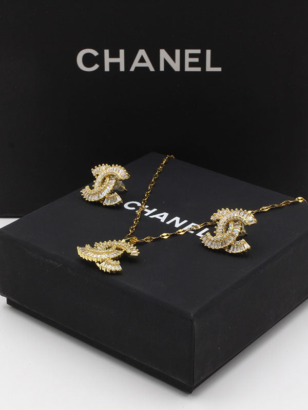 طقم شانيل زركون كيوبك ذهبي اطقم chanel  