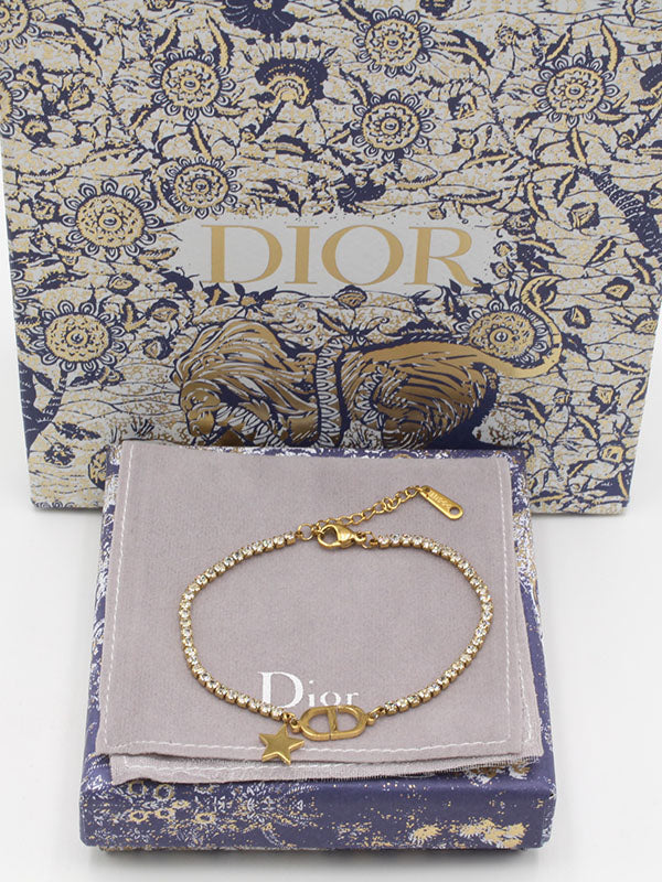 اساور ديور لوقو ستار اسواره dior ذهبي 