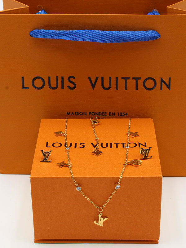 طقم لويس فيتون ذهبي 02533 اطقم louis vuitton  