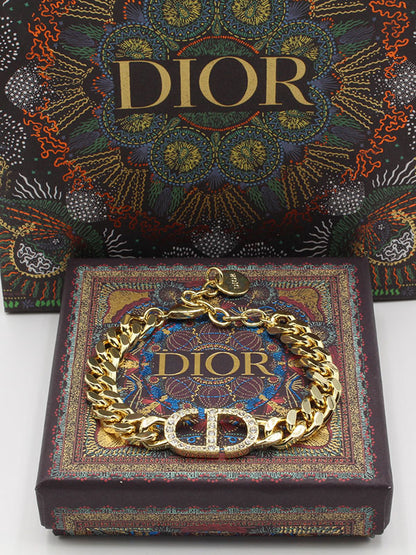 اساور ديور كريستال لوقو اسواره dior ذهبي 