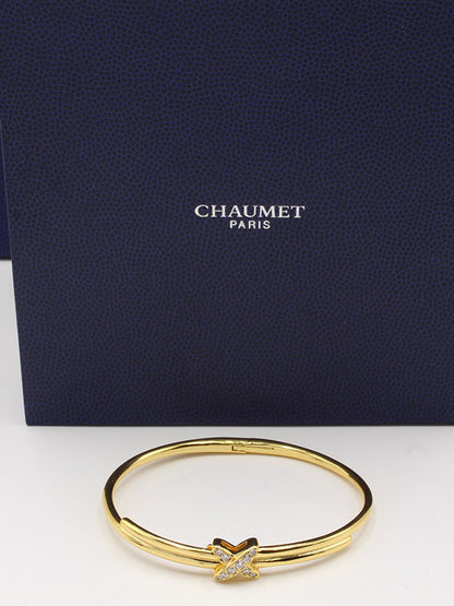 اسوارة شومية اكس زركون بانقل لوقو اسواره chaumet ذهبي 