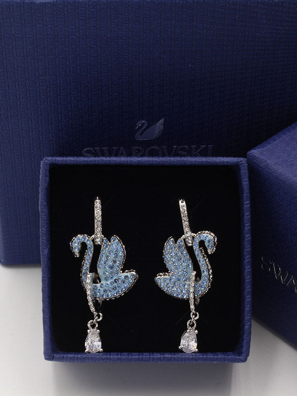 حلق سواروفسكي سوان زركون سماوي لوقو حلق Swarovski  