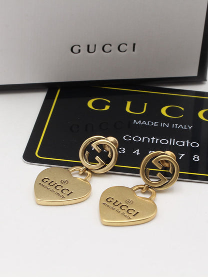 حلق قوتشي هارت انتيك مطفي حلق gucci ذهبي