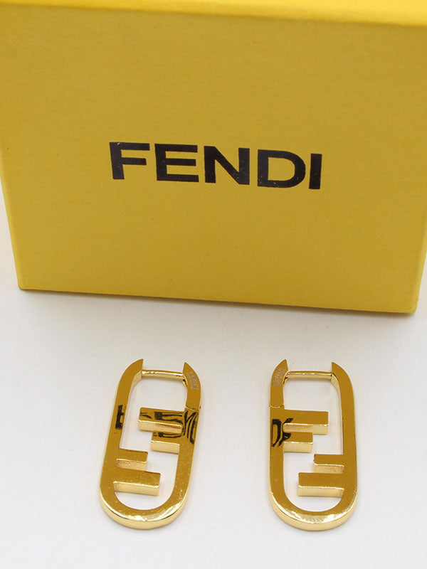 حلق فندي ميتال ذهبي وسط حلق fendi ذهبي